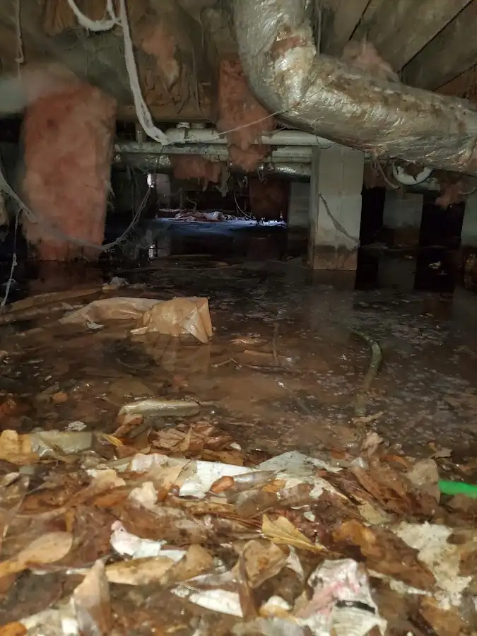 Crawl space flood assessment for Commercial Water Damage Restoration in Derby